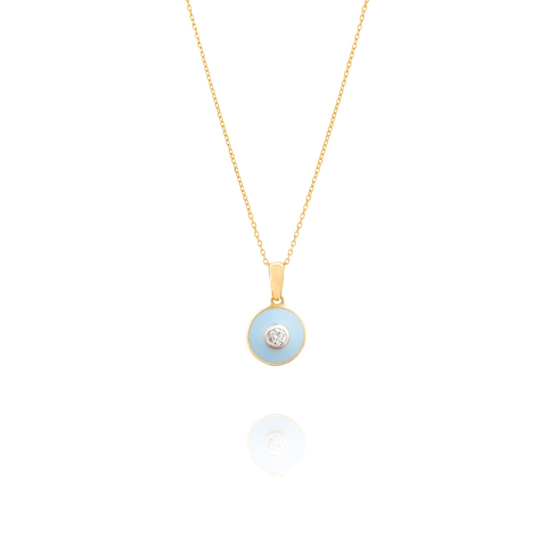 Gold necklace with a blue pendant on a white background  bubble_Pop_Pendant  Tiny Jewels.