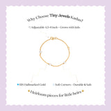Tiny Jewels gold bracelet on a white background with text about Tiny Jewels Kadas
