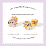Tiny Jewels gold ear studs with cartoon character design on a light purple background