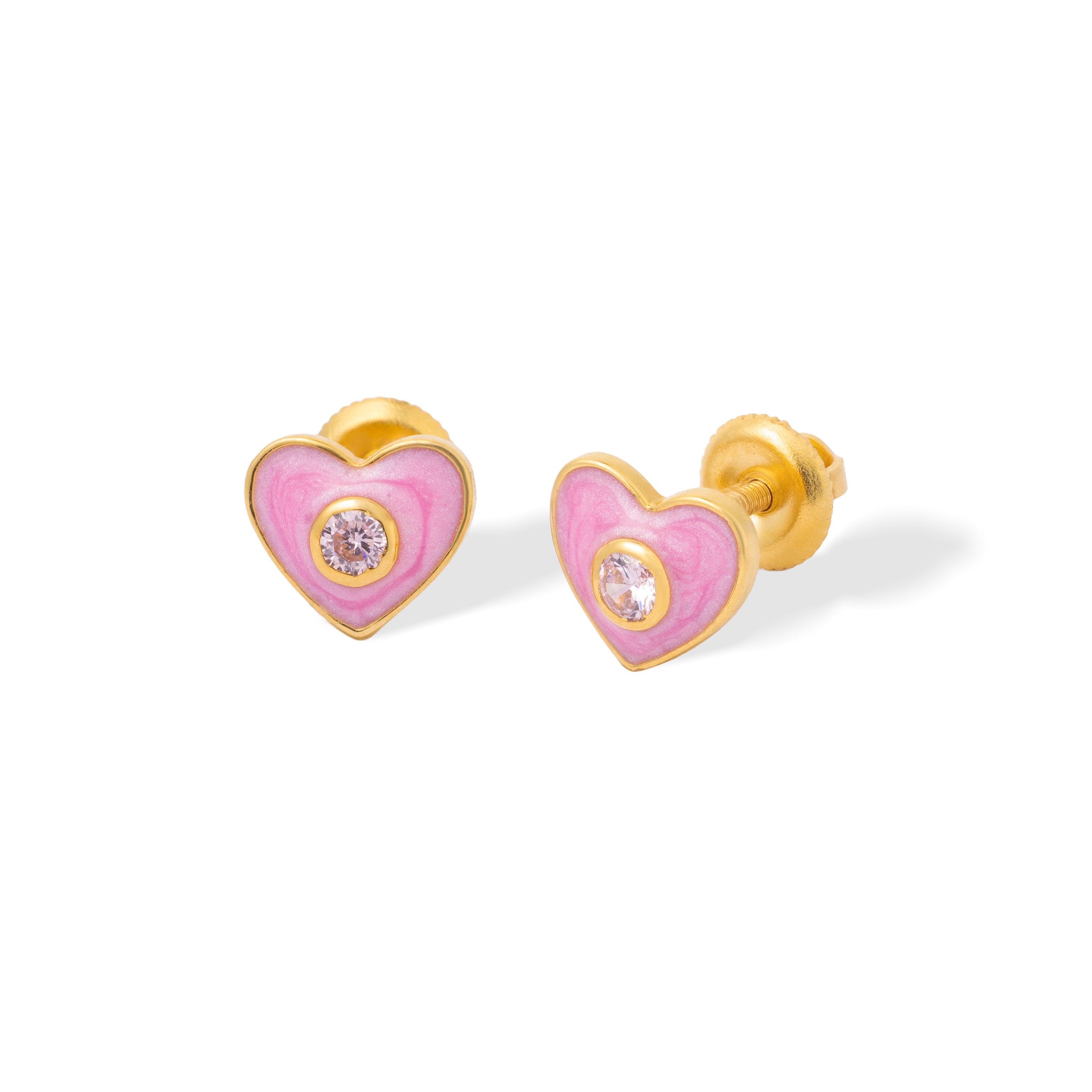 Tiny Jewels heart-shaped earrings with pink enamel and gold accents on a white background