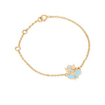 Tiny Jewels gold bracelet with a butterfly charm on a white background