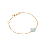 Tiny Jewels gold bracelet with a blue evil eye charm on a white background