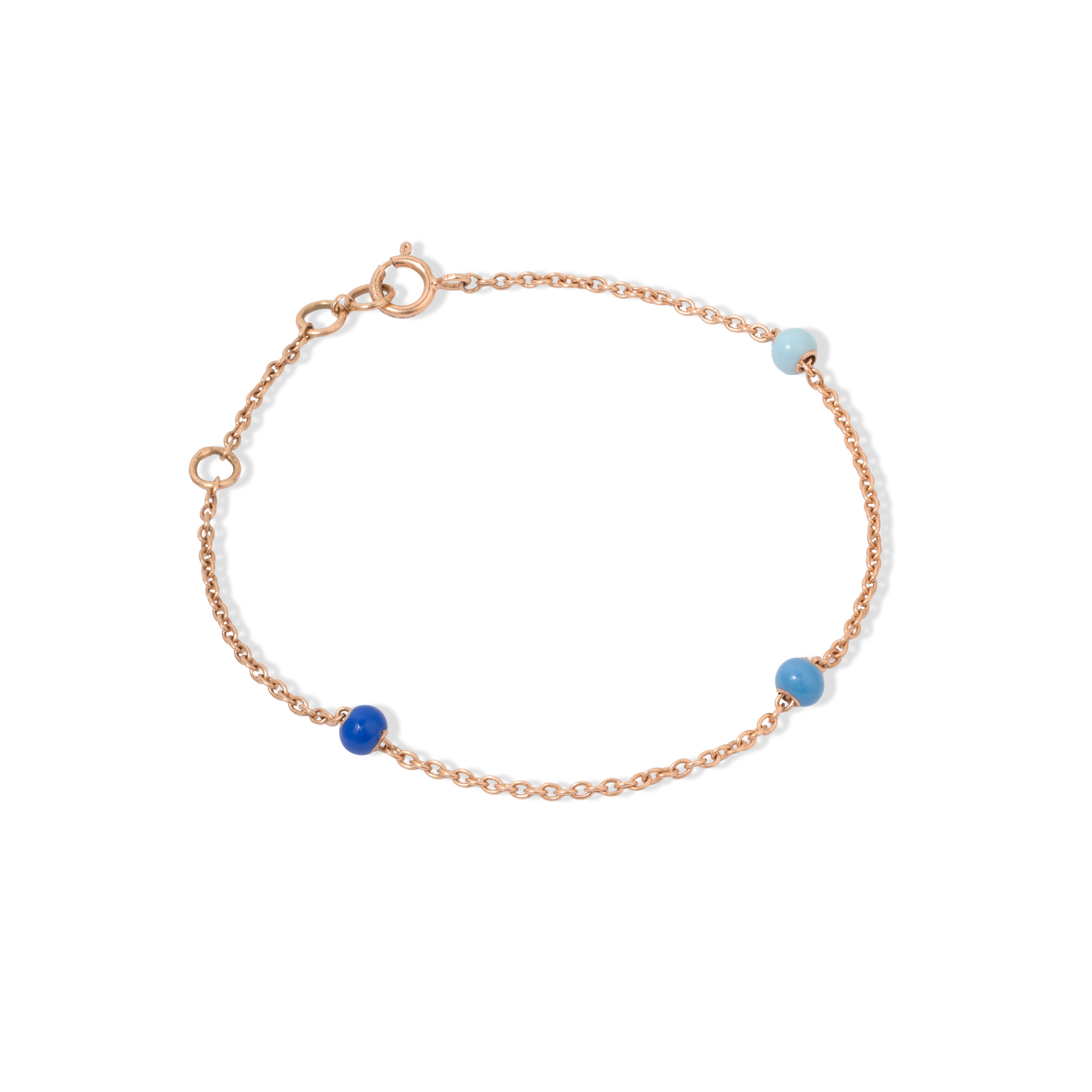 Tiny Jewels rose gold bracelet with blue beads on a white background
