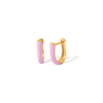 Tiny Jewels gold hoop earrings with pink enamel on a white background