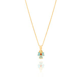 Tiny Jewels gold pendant with a blue flower design on a white background