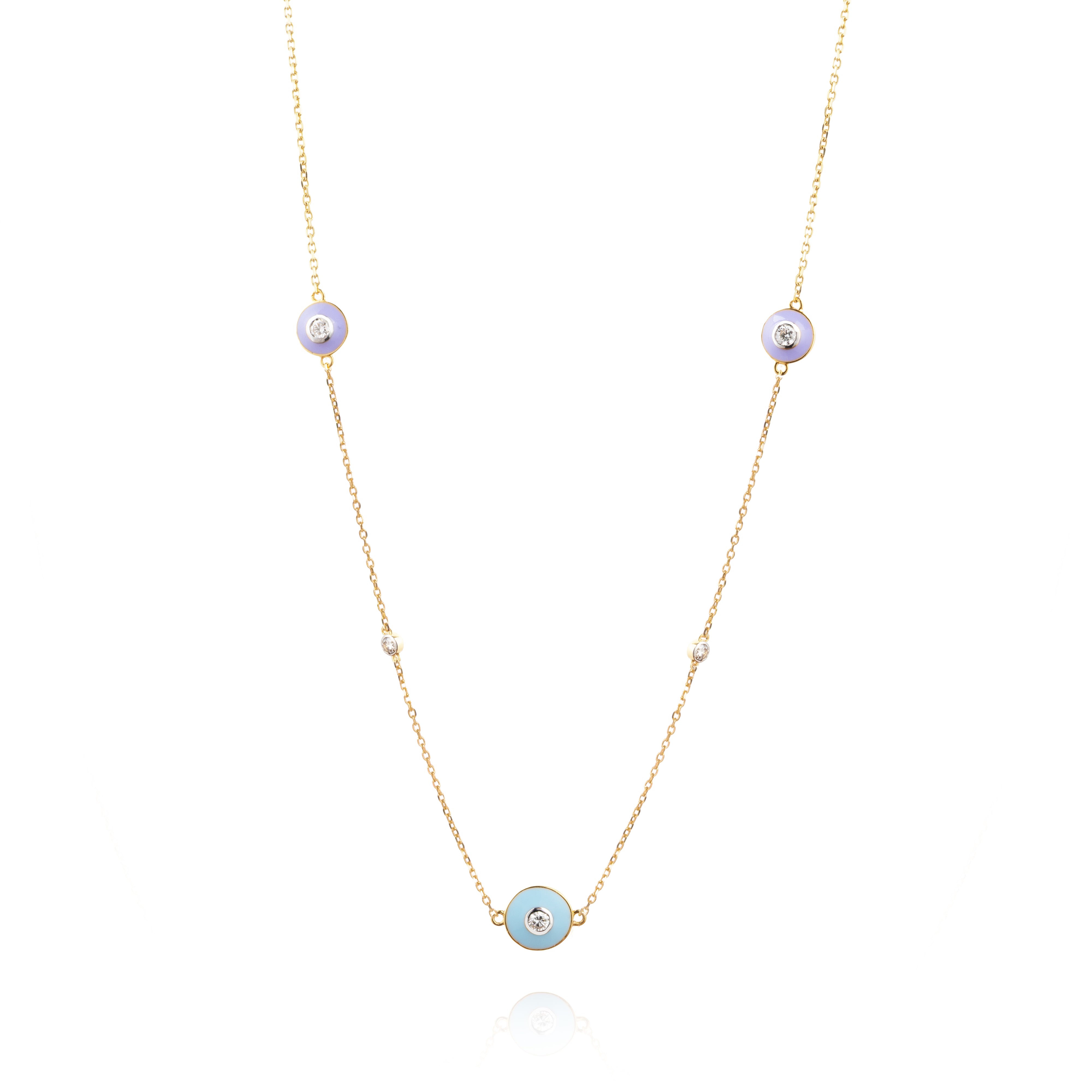 Tiny Jewels delicate necklace with small round pendants on a white background