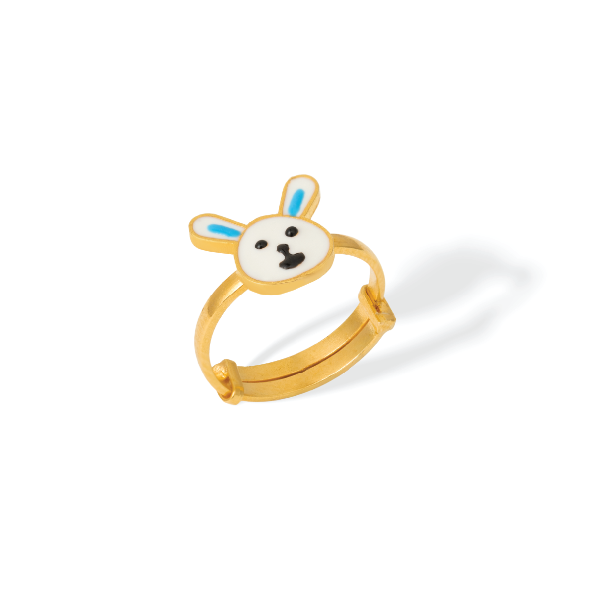 Tiny Jewels gold ring with a cartoonish face design on a white background