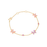 Tiny Jewels gold bracelet with pink butterfly charms on a white background