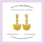 Tiny Jewels gold butterfly earrings on a white card with text about Tiny Jewels Drops.