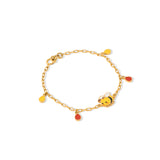 Tiny Jewels gold bracelet with charms on a white background