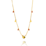 Tiny Jewels gold necklace with a bee pendant on a white background