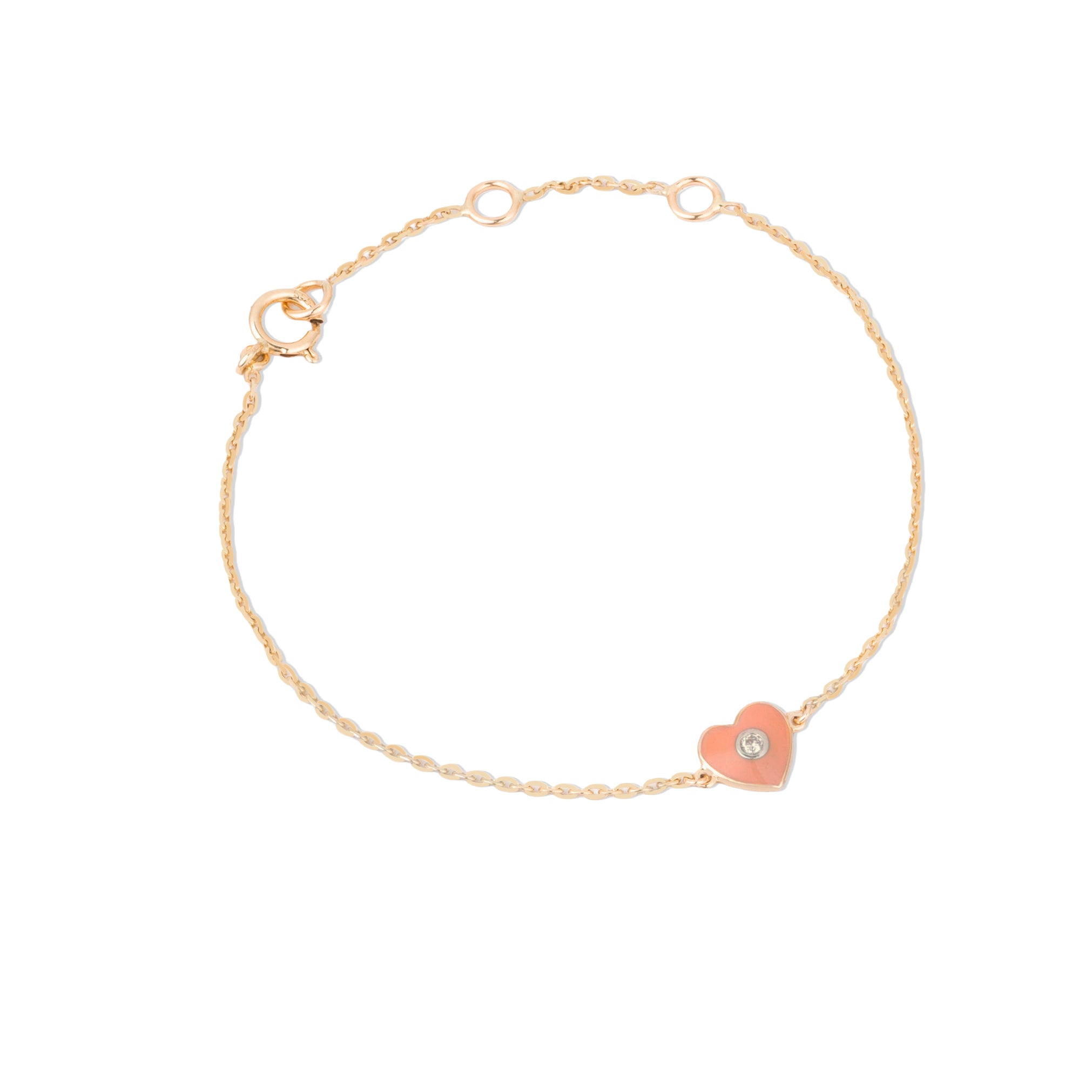 Tiny Jewels gold bracelet with a heart-shaped charm on a white background