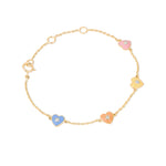 Tiny Jewels gold bracelet with colorful heart-shaped charms on a white background