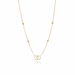 Tiny Jewels gold and silver necklace with interlocking rings on a white background