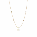 Tiny Jewels gold and silver necklace with interlocking rings on a white background