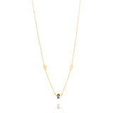 Tiny Jewels gold necklace with small beads on a white background