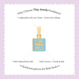 Tiny Jewels gold and blue pendant on a white card with text about Tiny Jewels Pendants