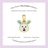 Tiny Jewels Gold pendant shaped like a rabbit with blue accents on a white background
