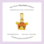 Tiny Jewels gold pendant with cartoon character on a white background with text about Tiny Jewels Pendants.