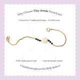 Tiny Jewels gold bracelet with black beads on a white background with promotional text about Tiny Jewels Nazariyas.