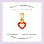 Tiny Jewels Gold and red heart-shaped pendant on a white card with text about Tiny Jewels Pendants.