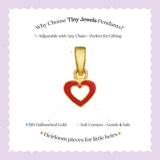 Tiny Jewels Gold and red heart-shaped pendant on a white card with text about Tiny Jewels Pendants.