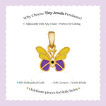Tiny Jewels Gold butterfly pendant with purple center on a light purple background