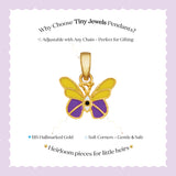Tiny Jewels Gold butterfly pendant with purple center on a light purple background