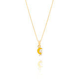 Tiny Jewels Gold pendant with a yellow crescent moon and white bear on a white background