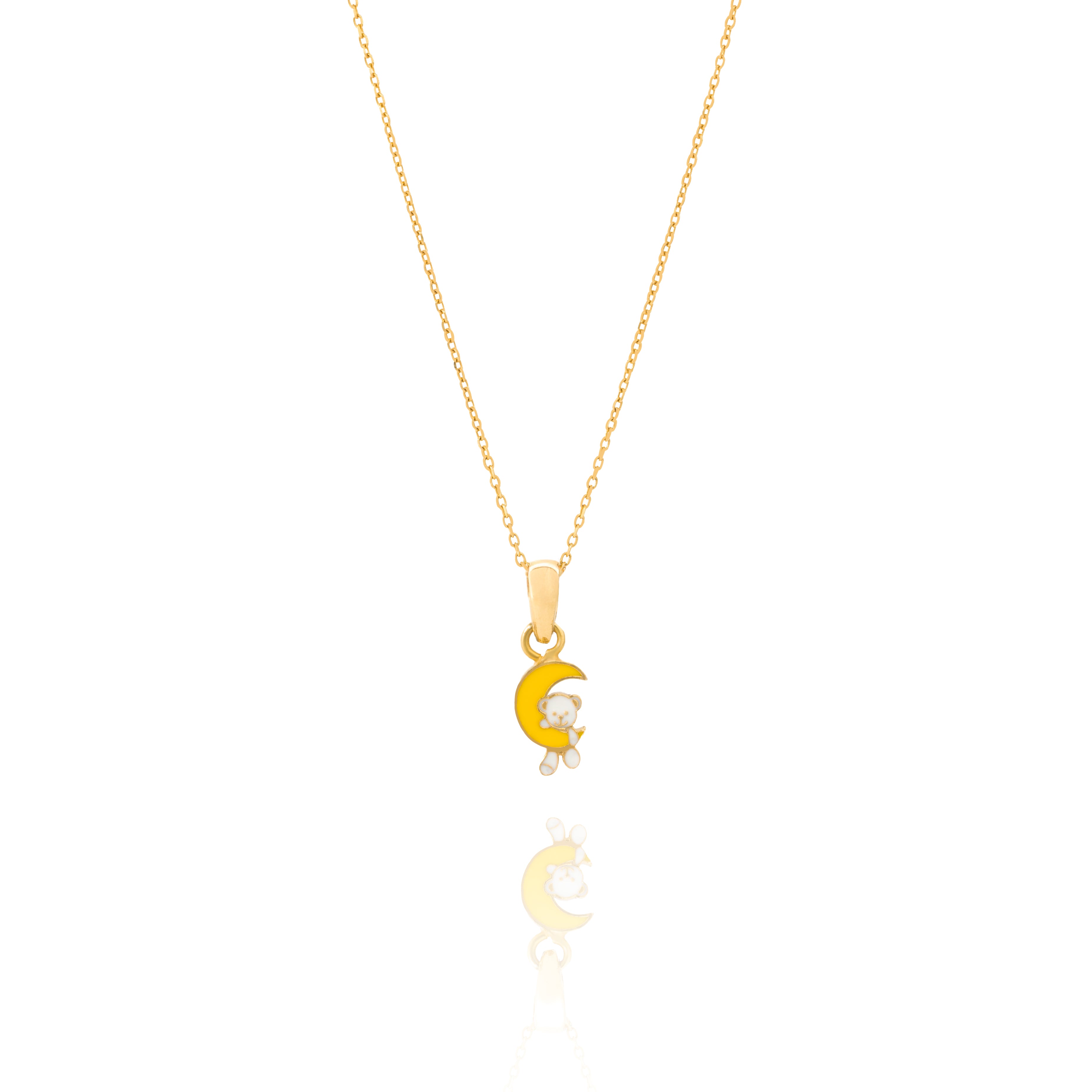Tiny Jewels Gold pendant with a yellow crescent moon and white bear on a white background