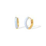 Tiny Jewels gold hoop earrings with light blue circular stones on a white background