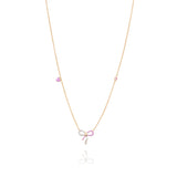 Tiny Jewels necklace with a pink bow charm on a white background