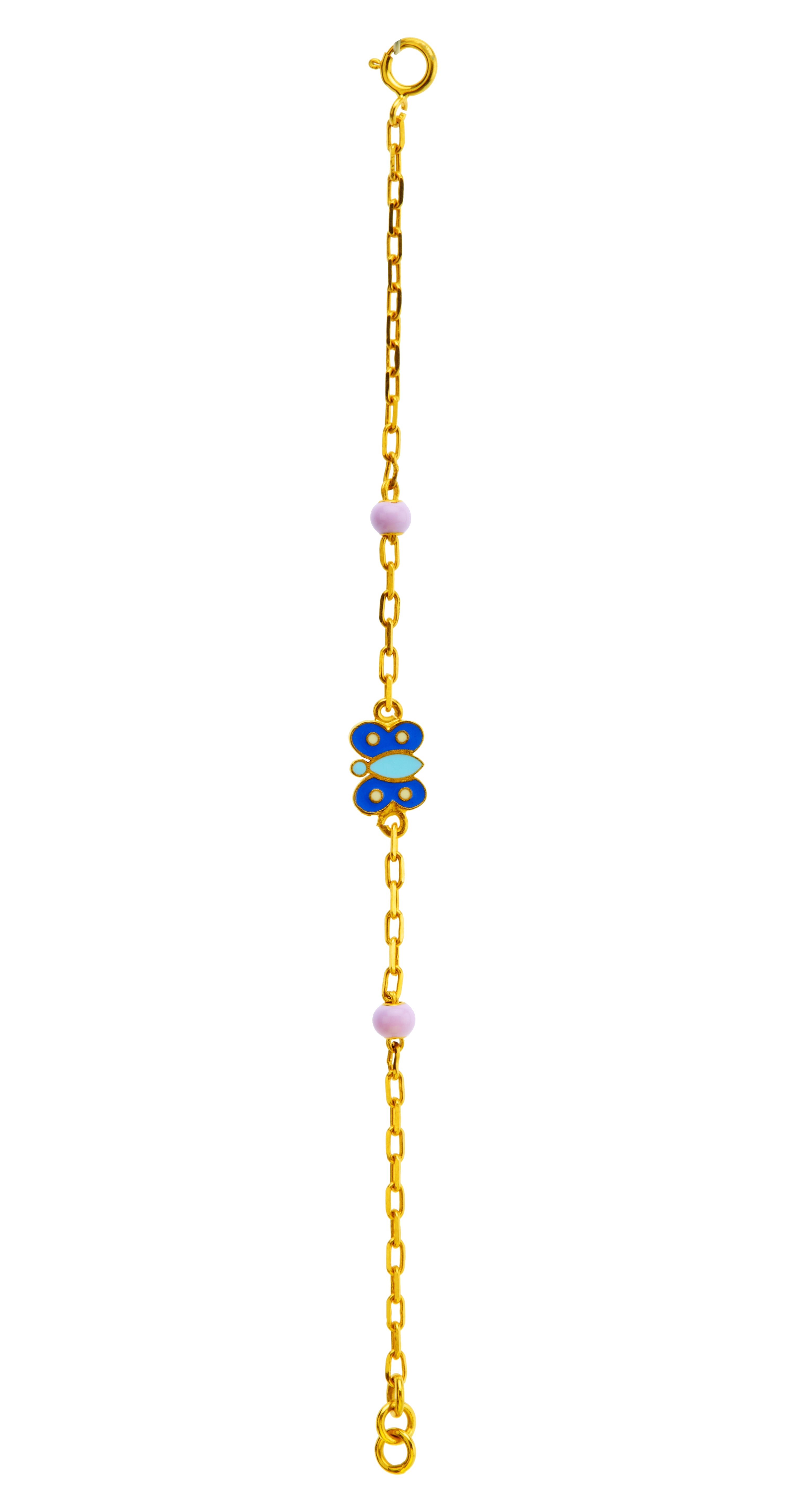 Tiny Jewels gold chain bracelet with blue butterfly charm on a white background