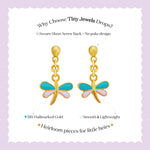 Tiny Jewels gold dragonfly-shaped earrings with green and pink details on a white background.