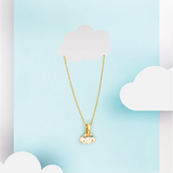 Tiny Jewels gold necklace with a cloud-shaped pendant on a light blue background with white clouds.