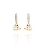Tiny Jewels gold elephant earrings with diamond accents on a white background