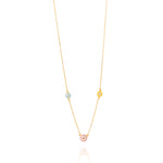 Tiny Jewels gold necklace with three colorful beads on a white background
