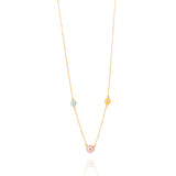 Tiny Jewels gold necklace with three colorful beads on a white background