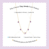 Tiny Jewels necklace with floral pendants on a light purple background, featuring text about the product.