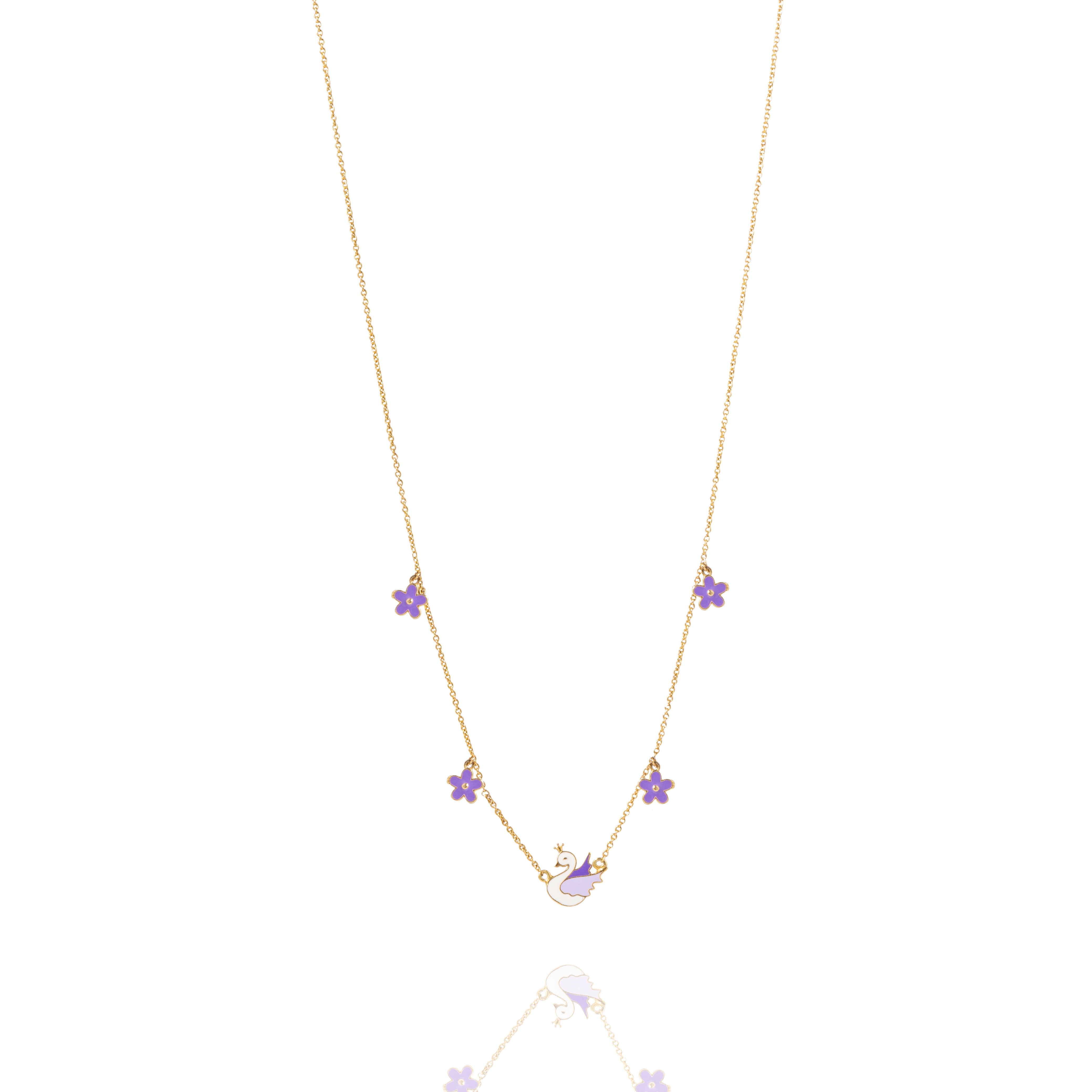 Tiny Jewels gold necklace with purple gemstones on a white background