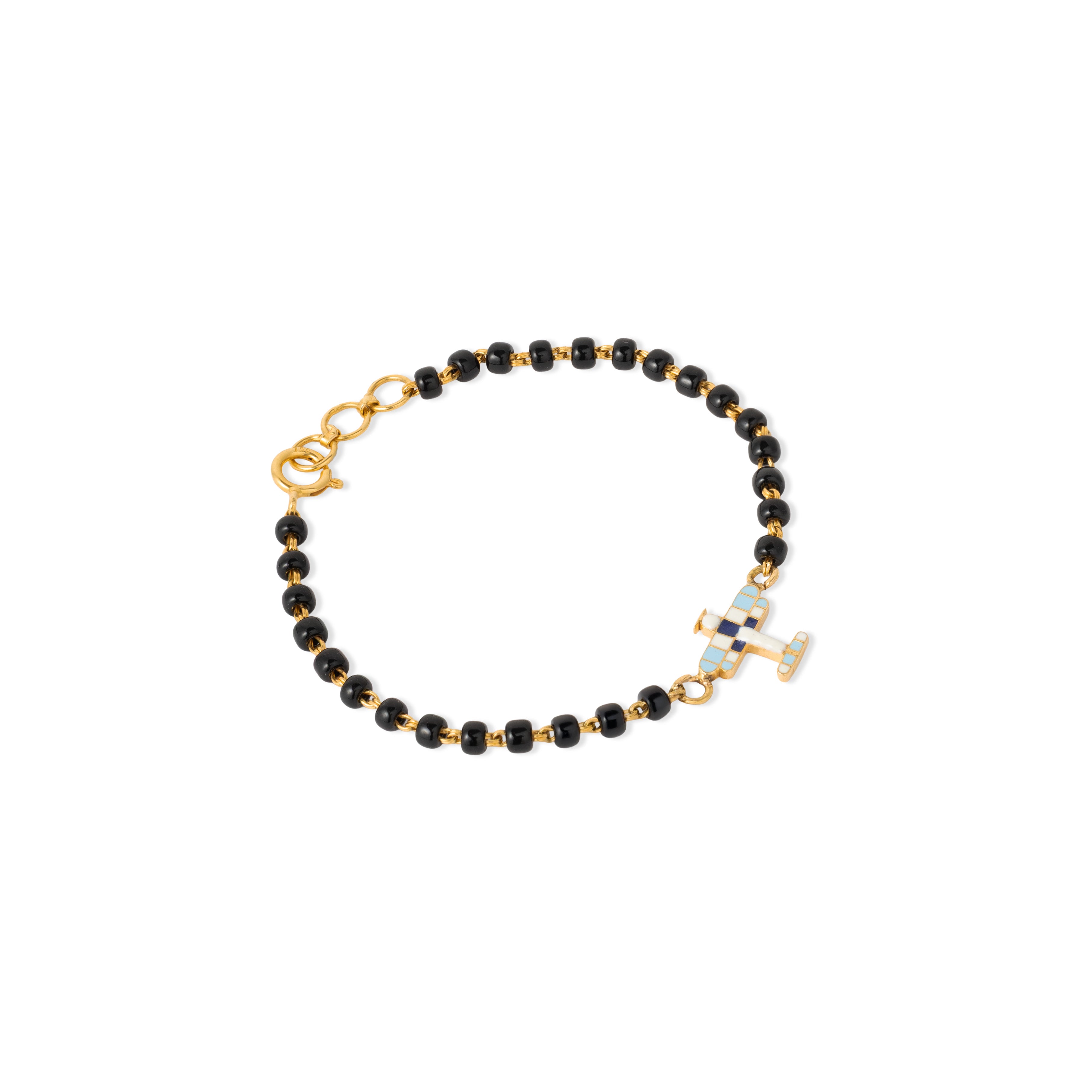 Tiny Jewels bracelet with black beads and gold accents on a white background
