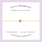 Tiny Jewels advertisement for Tiny Jewels Kadas jewelry on a light purple background