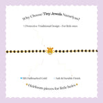 Tiny Jewels jewelry advertisement for Tiny Jewels Nazariyas with a gold and black beaded bracelet on a light purple background.