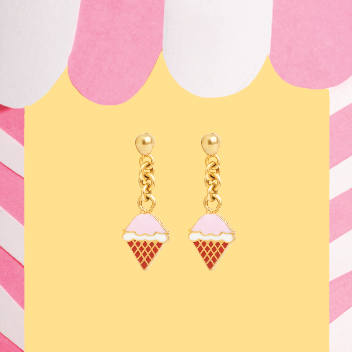 Tiny Jewels ice cream cone earrings on a colorful background