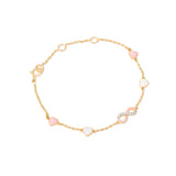 Tiny Jewels gold bracelet with heart-shaped pink and white beads on a white background
