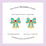 Tiny Jewels bow-shaped earrings with gold and turquoise design on a light purple background