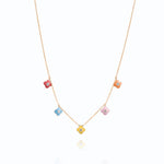 Tiny Jewels necklace with colorful flower-shaped pendants on a white background