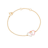 Tiny Jewels gold bracelet with a heart-shaped clasp on a white background