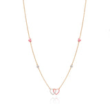 Tiny Jewels necklace with heart-shaped pendant on a white background