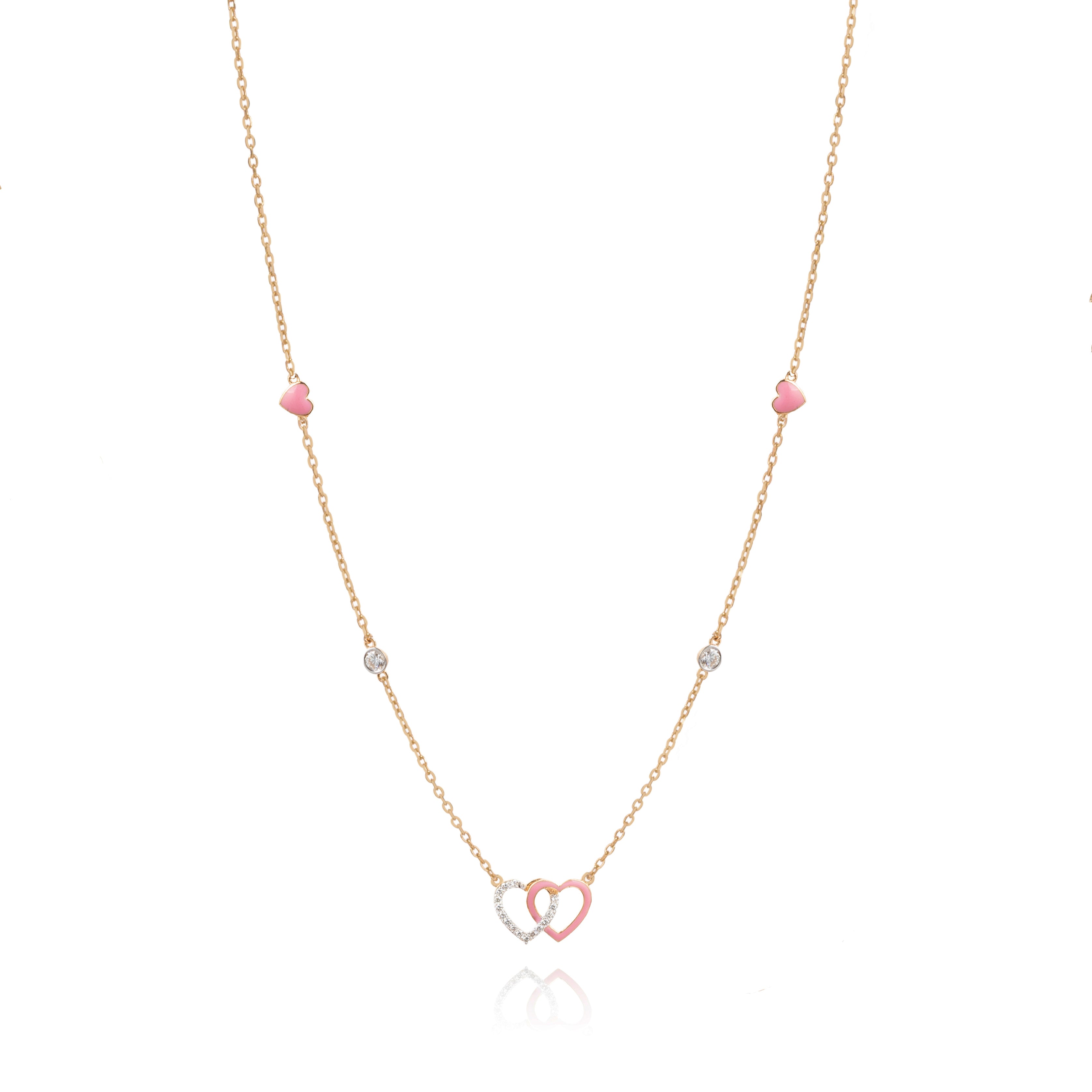 Tiny Jewels necklace with heart-shaped pendant on a white background
